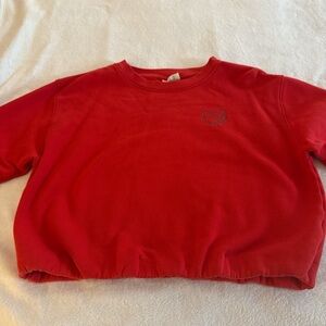 Red Woman’s crop sweatshirt with heart emblem